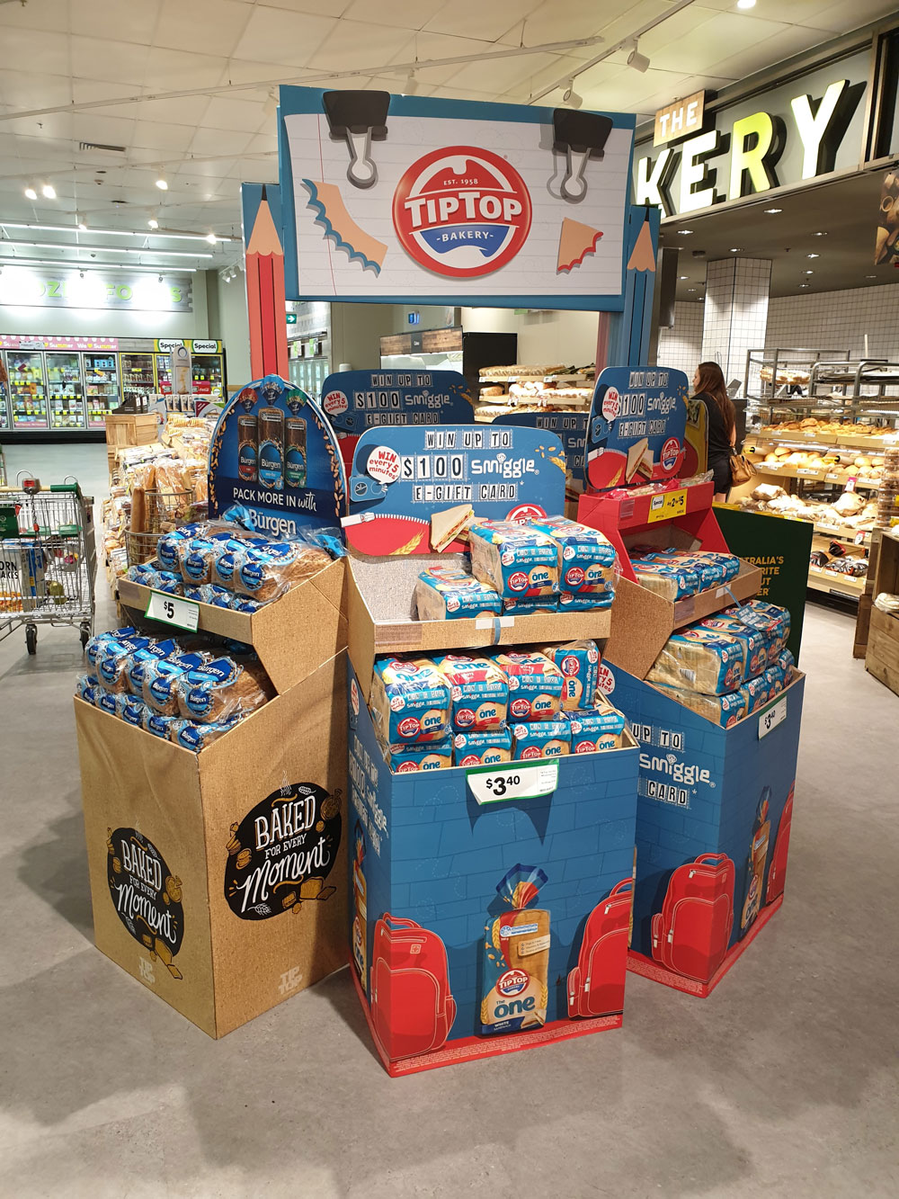 TipTop retail display stands promoting prodct competition in a grocery store