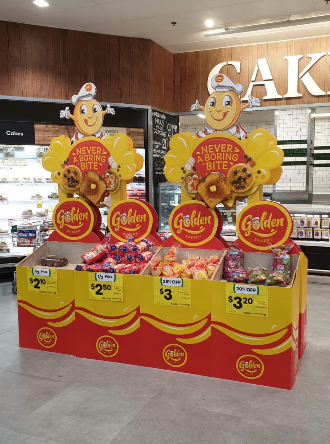 Golden Bakery retail display stands for various products