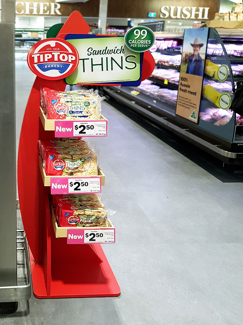 Tip Top'Sandwich Thins' display near butcher section of grocery store